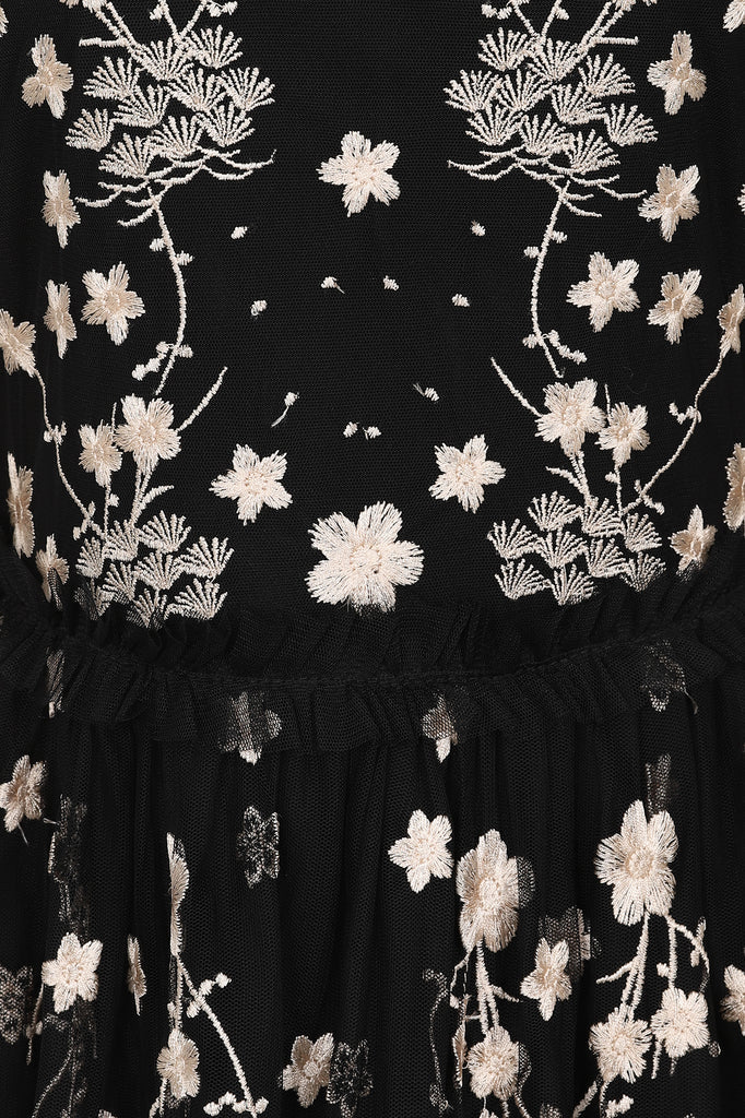 Robe midi noire brodée de fleurs